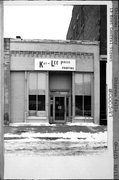 13 E CENTRAL ST, a Commercial Vernacular small retail building, built in Chippewa Falls, Wisconsin in 1890.
