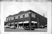 26 W GRAND AVE, a Commercial Vernacular automobile showroom, built in Chippewa Falls, Wisconsin in 1924.