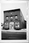 105 S MAIN ST, a Commercial Vernacular small retail building, built in Greenwood, Wisconsin in 1899.