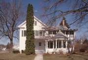 348 S DICKASON BLVD, a Greek Revival house, built in Columbus, Wisconsin in 1857.