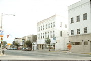 228-230 W WISCONSIN, a Romanesque Revival lodging-hotel, built in Portage, Wisconsin in 1869.