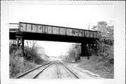 MILL ST AT CHICAGO & NORTHWESTERN RAILROAD TRACKS, a NA (unknown or not a building) bridge, built in Lodi, Wisconsin in 1896.