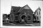 226 W CARROLL ST, a Queen Anne house, built in Portage, Wisconsin in 1898.