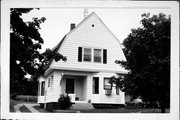 315 W CARROLL ST, a Dutch Colonial Revival house, built in Portage, Wisconsin in 1910.
