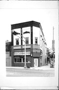 100 E COOK 100 E COOK, a Commercial Vernacular small retail building, built in Portage, Wisconsin in 1892.