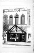 118-122 W COOK ST, a Italianate retail building, built in Portage, Wisconsin in 1869.