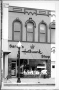 118-122 W COOK ST, a Italianate retail building, built in Portage, Wisconsin in 1869.