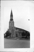 305 W COOK ST, a Romanesque Revival church, built in Portage, Wisconsin in 1886.