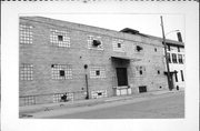 107 E MULLETT ST, a Astylistic Utilitarian Building mill, built in Portage, Wisconsin in 1936.