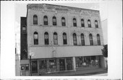 228-230 W WISCONSIN, a Romanesque Revival lodging-hotel, built in Portage, Wisconsin in 1869.