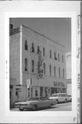 228-230 W WISCONSIN, a Romanesque Revival lodging-hotel, built in Portage, Wisconsin in 1869.