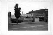 120 W Blackhawk Ave, a Commercial Vernacular small retail building, built in Prairie du Chien, Wisconsin in 1957.