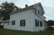 N7436 STATE HIGHWAY 26, a Greek Revival house, built in Burnett, Wisconsin in 1862.