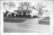 118 W STATE ST, a Greek Revival house, built in Fox Lake, Wisconsin in 1850.