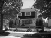 817 Oakland Ave, a Dutch Colonial Revival house, built in Sheboygan, Wisconsin in 1928.