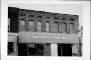 421 E MAIN ST (STATE HIGHWAY 49), a Commercial Vernacular large retail building, built in Waupun, Wisconsin in 1895.