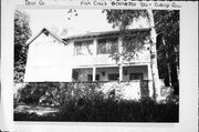 9267 COTTAGE ROW, a Colonial Revival/Georgian Revival house, built in Gibraltar, Wisconsin in .