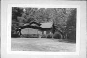13496 E WINNEBOUJOU RD  E SIDE OF BRULE RIVER, a Rustic Style house, built in Brule, Wisconsin in 1918.