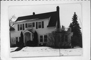 114 12TH ST SE, a Colonial Revival/Georgian Revival house, built in Menomonie, Wisconsin in 1923.