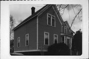 1203 14TH AVE E, a Gabled Ell house, built in Menomonie, Wisconsin in 1890.