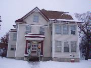 25 E FREDERICK ST, a Colonial Revival/Georgian Revival house, built in Rhinelander, Wisconsin in 1915.