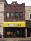 15 N BROWN ST, a Commercial Vernacular small retail building, built in Rhinelander, Wisconsin in 1914.