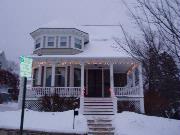 128 N PELHAM ST, a Queen Anne house, built in Rhinelander, Wisconsin in 1886.