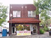 151 N BROWN ST, a Commercial Vernacular small retail building, built in Rhinelander, Wisconsin in 1921.