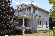 705 3RD ST, a American Foursquare house, built in Menasha, Wisconsin in 1905.