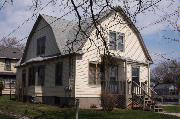 316 CHUTE ST, a Dutch Colonial Revival house, built in Menasha, Wisconsin in 1913.