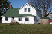 62108 CTH N, a Gabled Ell house, built in Eastman, Wisconsin in 1900.