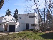 5226 N SANTA MONICA BLVD, a International Style house, built in Whitefish Bay, Wisconsin in 1936.