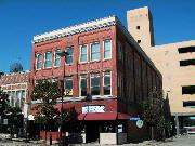 227-229 N WASHINGTON ST, a Commercial Vernacular large retail building, built in Green Bay, Wisconsin in 1887.
