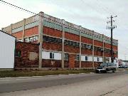 1402 STATE ST, a Astylistic Utilitarian Building warehouse, built in Green Bay, Wisconsin in 1920.