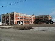 1402 STATE ST, a Astylistic Utilitarian Building warehouse, built in Green Bay, Wisconsin in 1920.