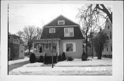 156 E 5TH ST, a Dutch Colonial Revival house, built in Fond du Lac, Wisconsin in 1900.