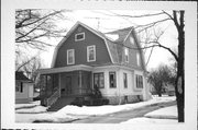 104 E 11TH ST, a Dutch Colonial Revival house, built in Fond du Lac, Wisconsin in 1900.