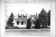 306 E OAK ST, a Greek Revival house, built in Lancaster, Wisconsin in 1863.