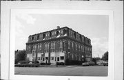 108 N WASHINGTON ST, a Second Empire lodging-hotel, built in Lancaster, Wisconsin in 1884.