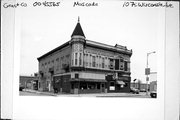 107 S WISCONSIN AVE, a Queen Anne retail building, built in Muscoda, Wisconsin in 1892.