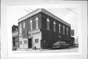 90 N 2ND ST, a Italianate small retail building, built in Platteville, Wisconsin in 1883.