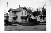 1902 9TH ST, a Queen Anne house, built in Monroe, Wisconsin in 1890.