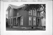 1902 9TH ST, a Queen Anne house, built in Monroe, Wisconsin in 1890.
