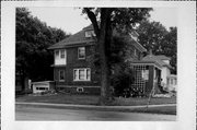 1922 12TH ST, a American Foursquare house, built in Monroe, Wisconsin in 1915.