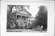 N1842 N. Brave Rd, a Greek Revival house, built in Mackford, Wisconsin in 1850.