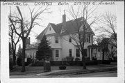 212-212A E HURON ST, a Queen Anne house, built in Berlin, Wisconsin in 1895.