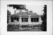 815 ILLINOIS AVE, a Colonial Revival/Georgian Revival house, built in Green Lake, Wisconsin in 1945.