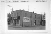 4 N BRIDGE ST, a Commercial Vernacular small retail building, built in Markesan, Wisconsin in 1875.