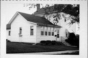 303 S JONES ST, a Gabled Ell house, built in Barneveld, Wisconsin in 1906.
