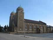 7101 W Orchard St, a Romanesque Revival house of worship, built in West Allis, Wisconsin in 1925.